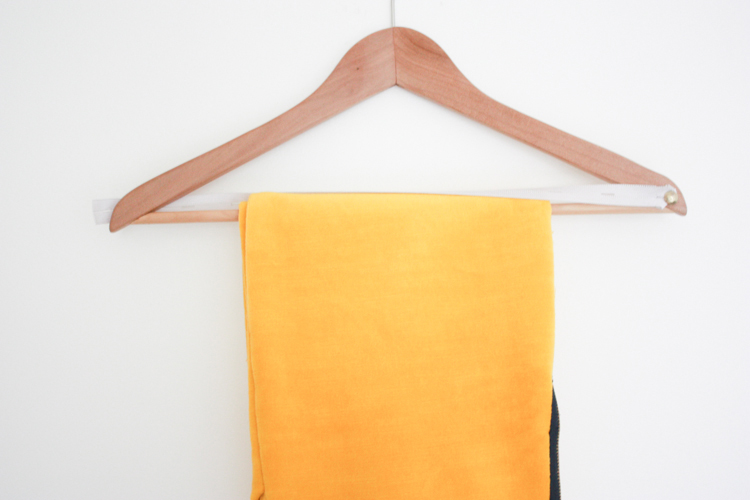 https://livefreecreative.co/wp-content/uploads/2013/03/One-Little-Minute-Blog-DIY-Ikea-Wooden-Trouser-Hanger.jpg