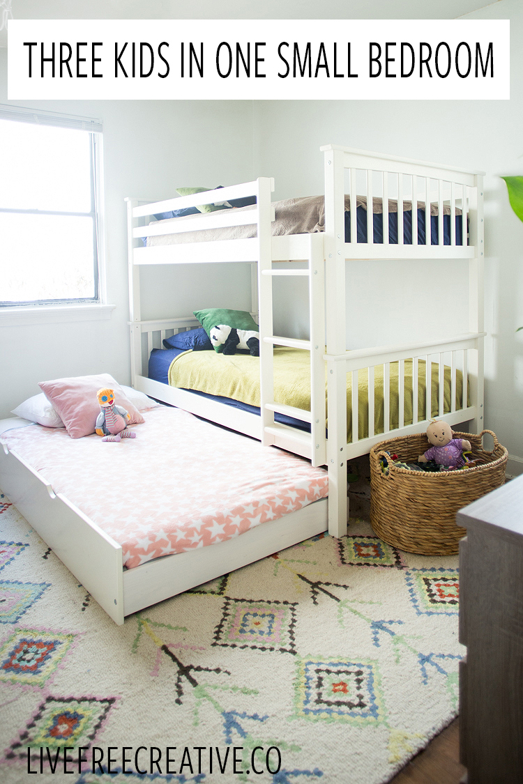 2 bunk beds in small room