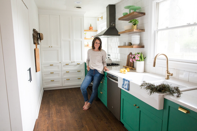 Bold, Small Kitchen with Green Cabinets and Slate Appliances